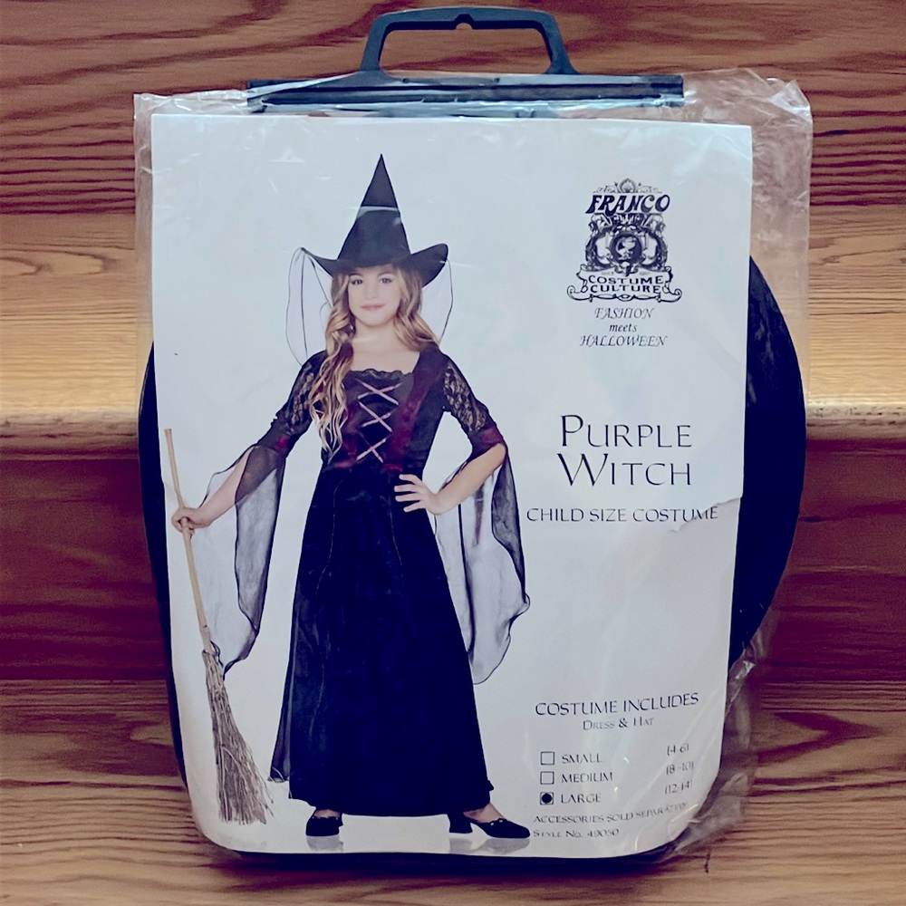 Child size purple witch costume includes dress and hat size large 12 to 14